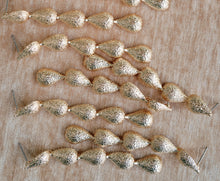 Swingy Textured Gold Teardrop Cascade Statement Earrings