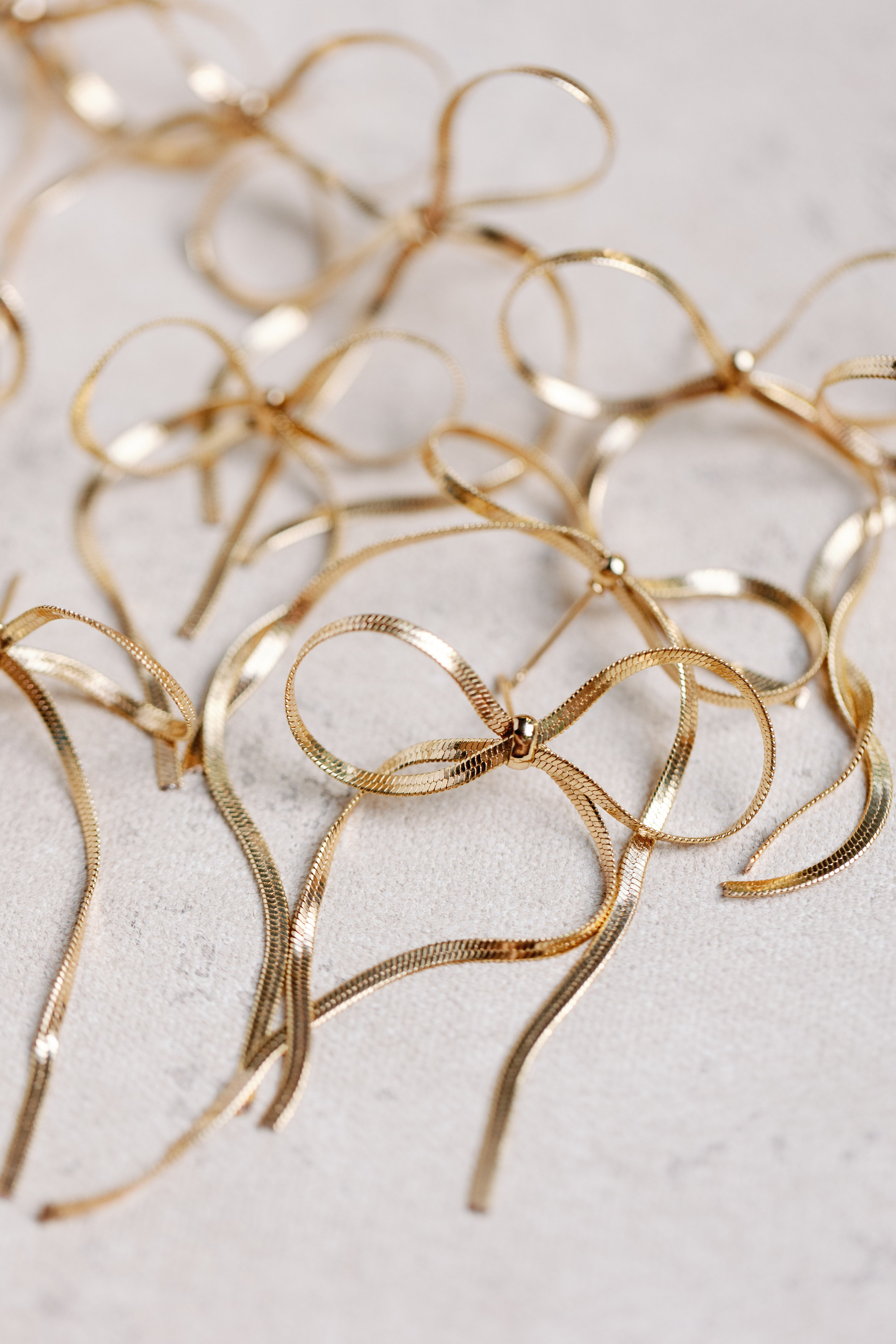 Maxi Gold Duster Bow Earrings