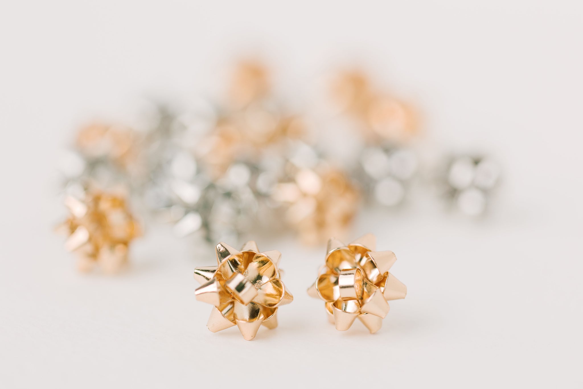 Gold christmas bow earrings sale